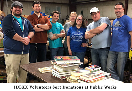 Image of IDEXX volunteers sorting book donations